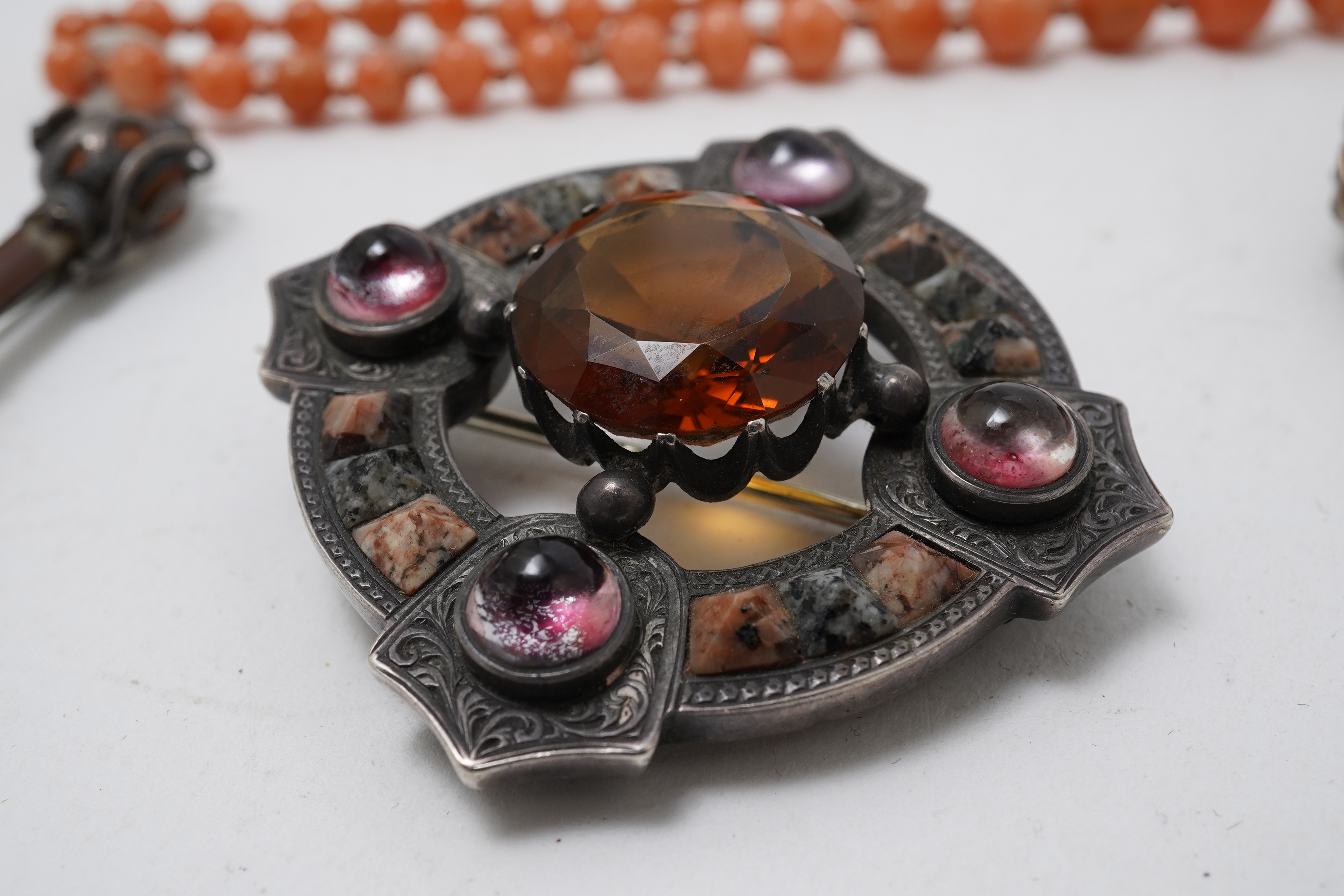 A collection of jewels including a coral necklace